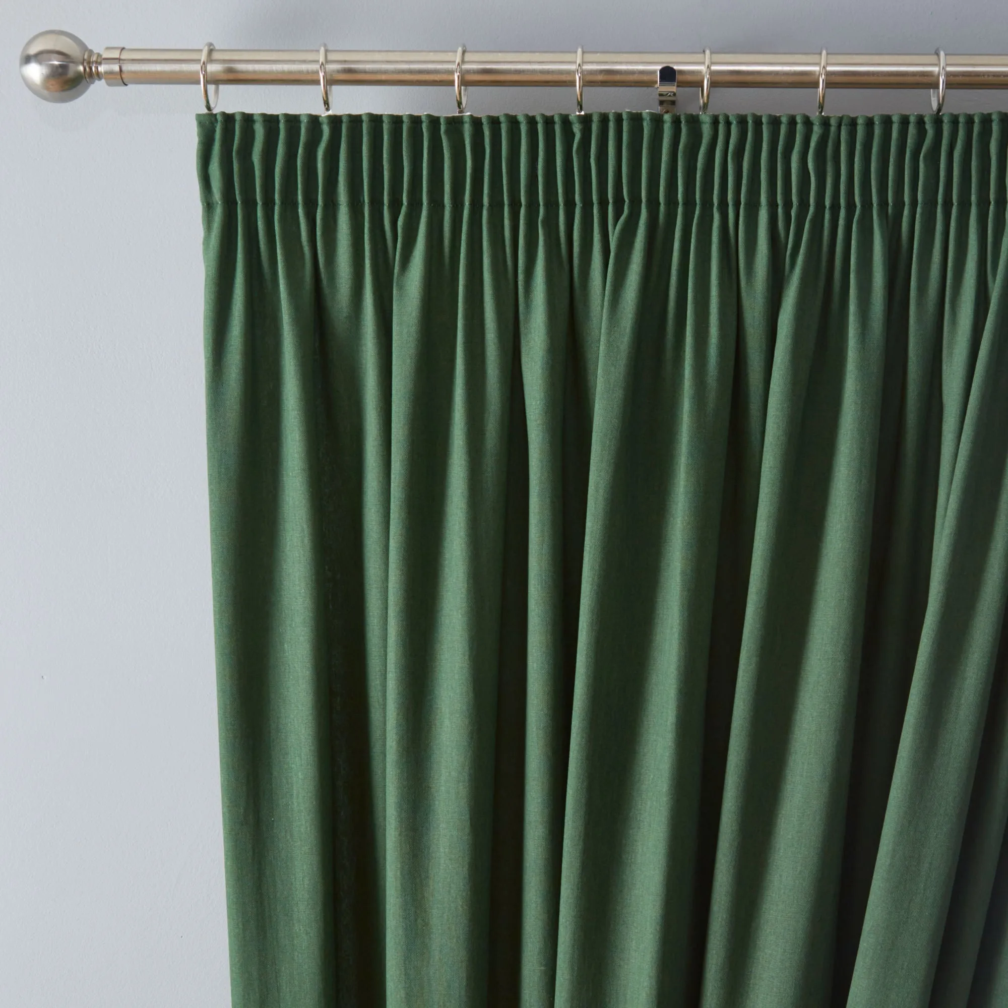 Dijon Pair of Pencil Pleat Curtains by Fusion in Bottle Green