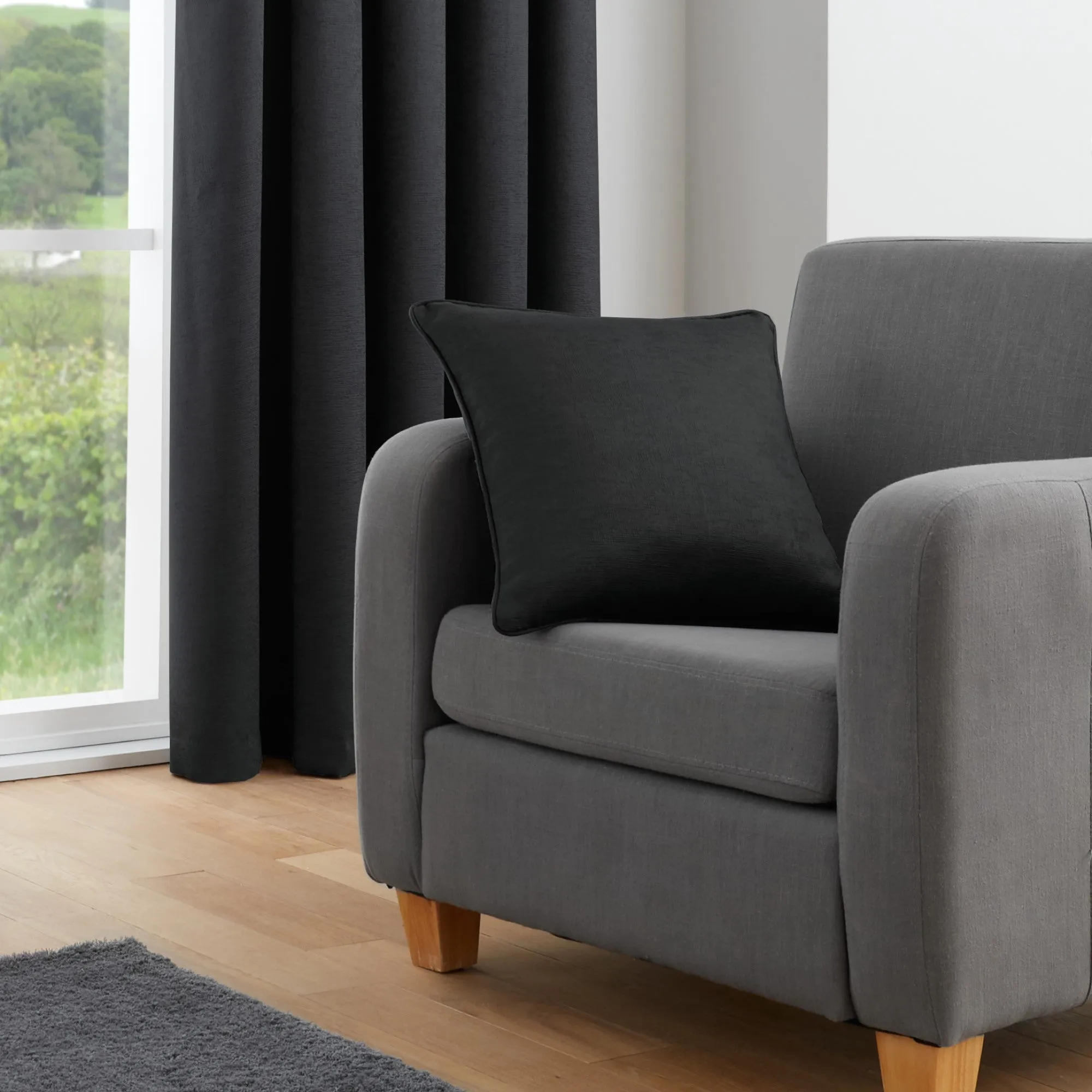 Galaxy Pair of Pencil Pleat Curtains by Fusion in Black