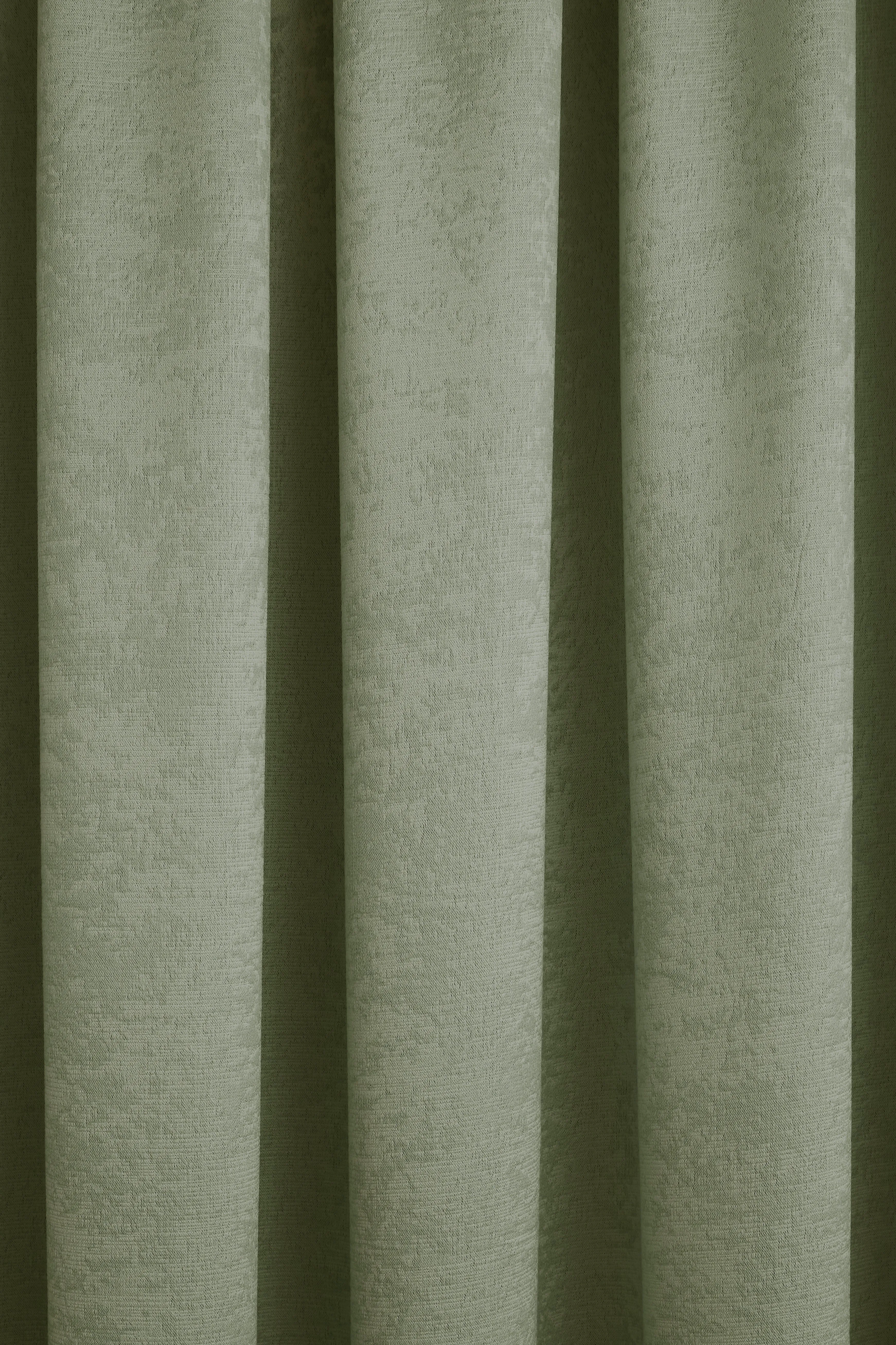 Galaxy Pair of Pencil Pleat Curtains by Fusion in Green