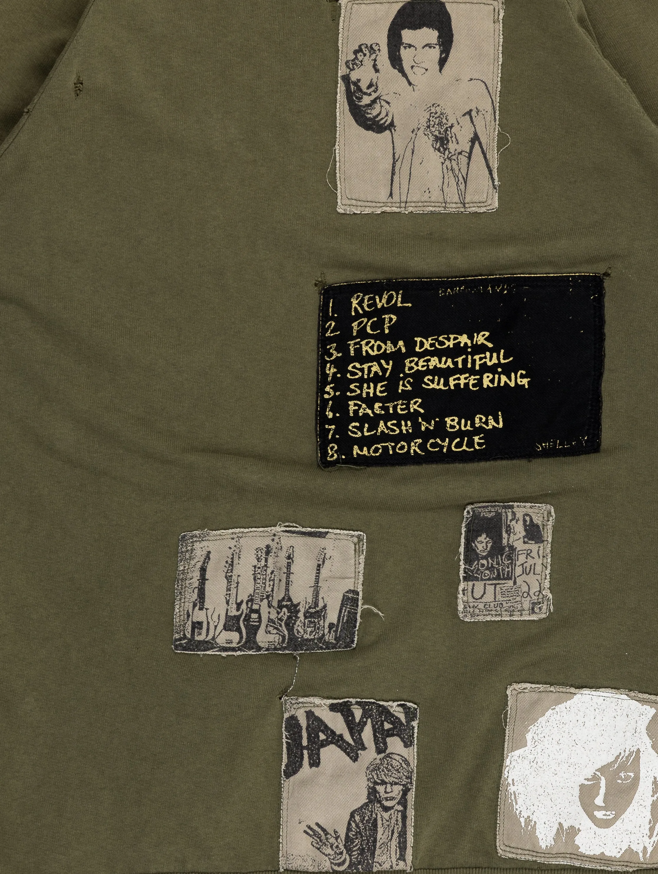 'Riot! Riot! Riot!' Thrashed Patchwork Crewneck